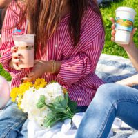 Maui Wowi customers holding cups
