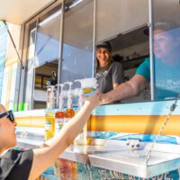 customer receiving a smoothie