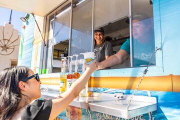 customer receiving a smoothie